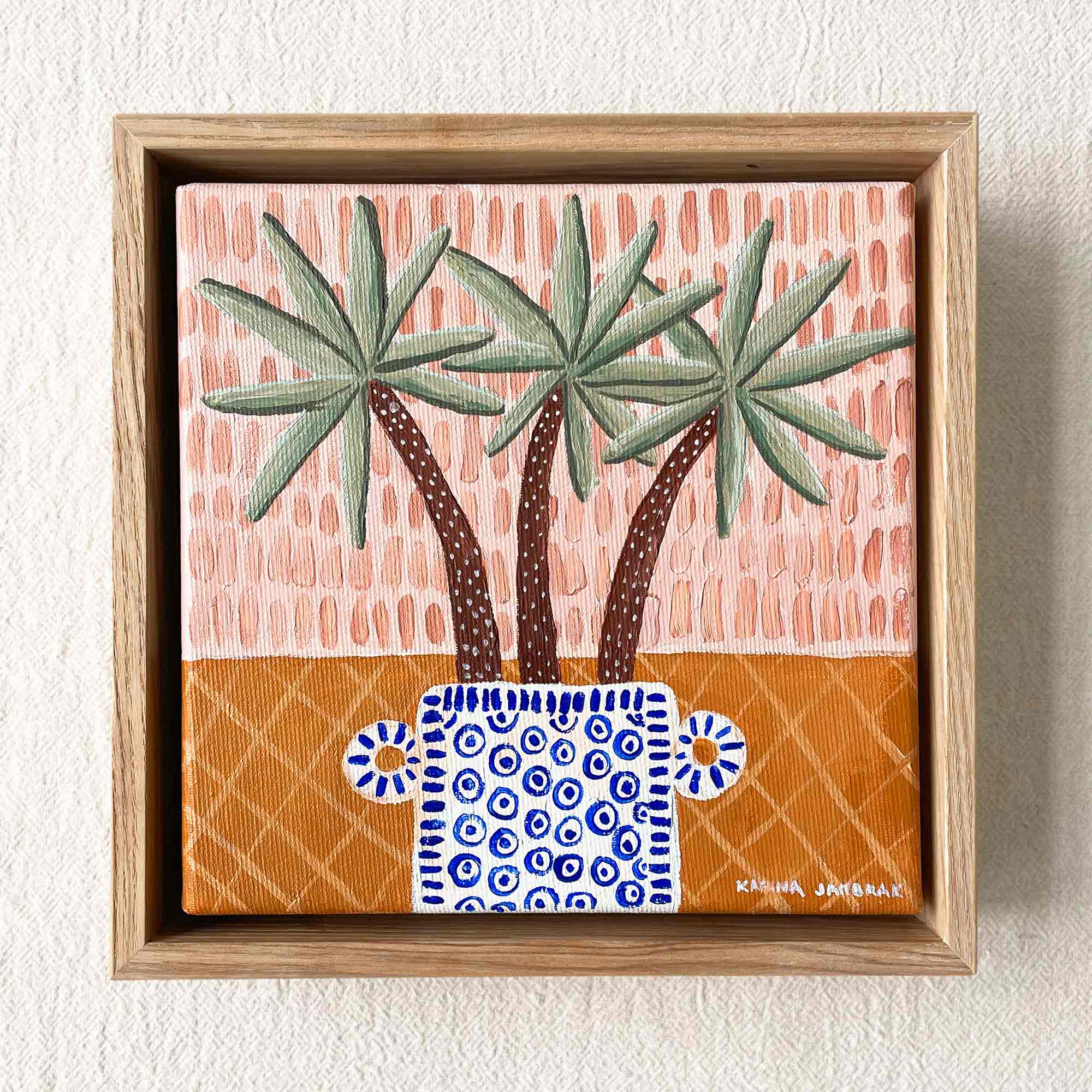 Fronds In Painted Vase Framed Canvas Print